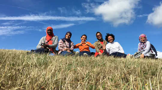 Grow participants smile for the camera.  (how a radical nature based agenda would help society overcome the psychological effects of coronavirus)