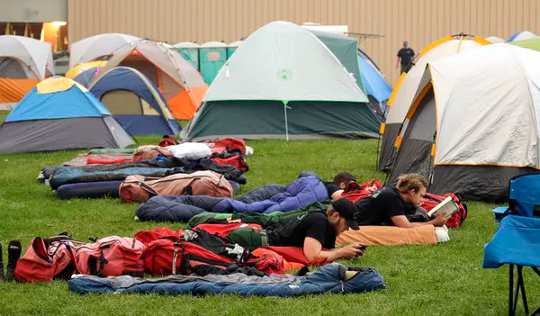 Firefighters take a break at a fire camp.