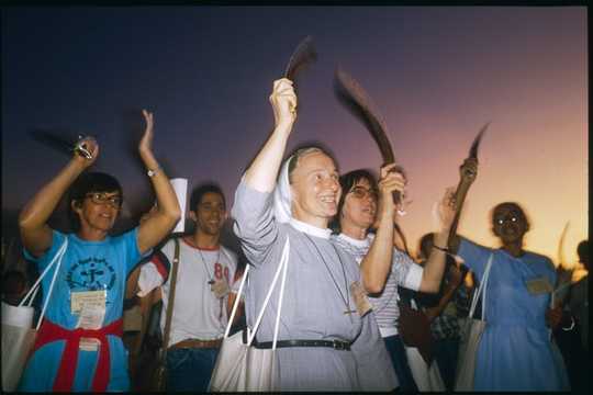 Why Catholic Priests Are Kneeling With Protesters