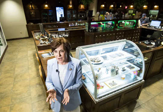 Rep. Jacky Rosen, D-Nev., speaks with local television after her tour of The Apothecary Shoppe marijuana dispensary in Las Vegas on May 29, 2018.