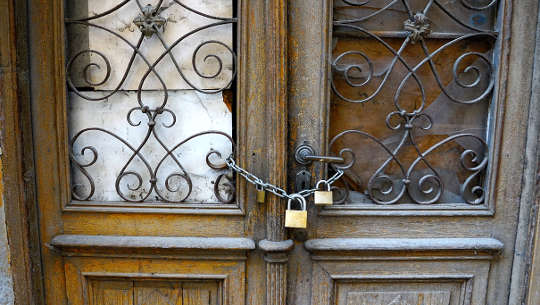 double doors locked with two padlocks