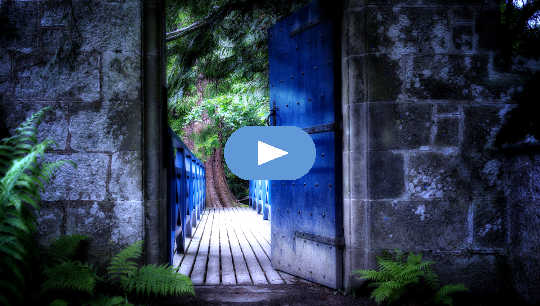 door opening onto a lighted walkway