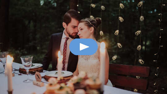 couple sitting at a gourmet dining table