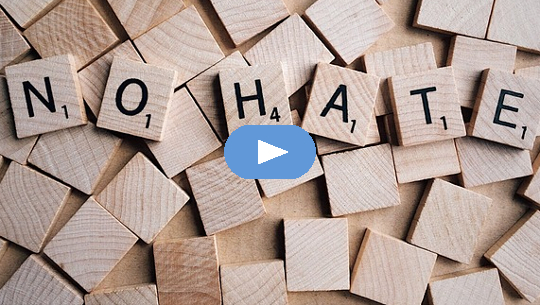 Scrabble letters that spell out: NO HATE