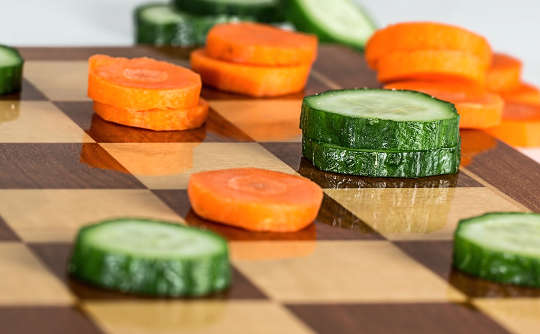 vegetable slices on a chess board