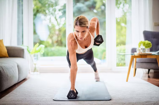 a woman lifting weights