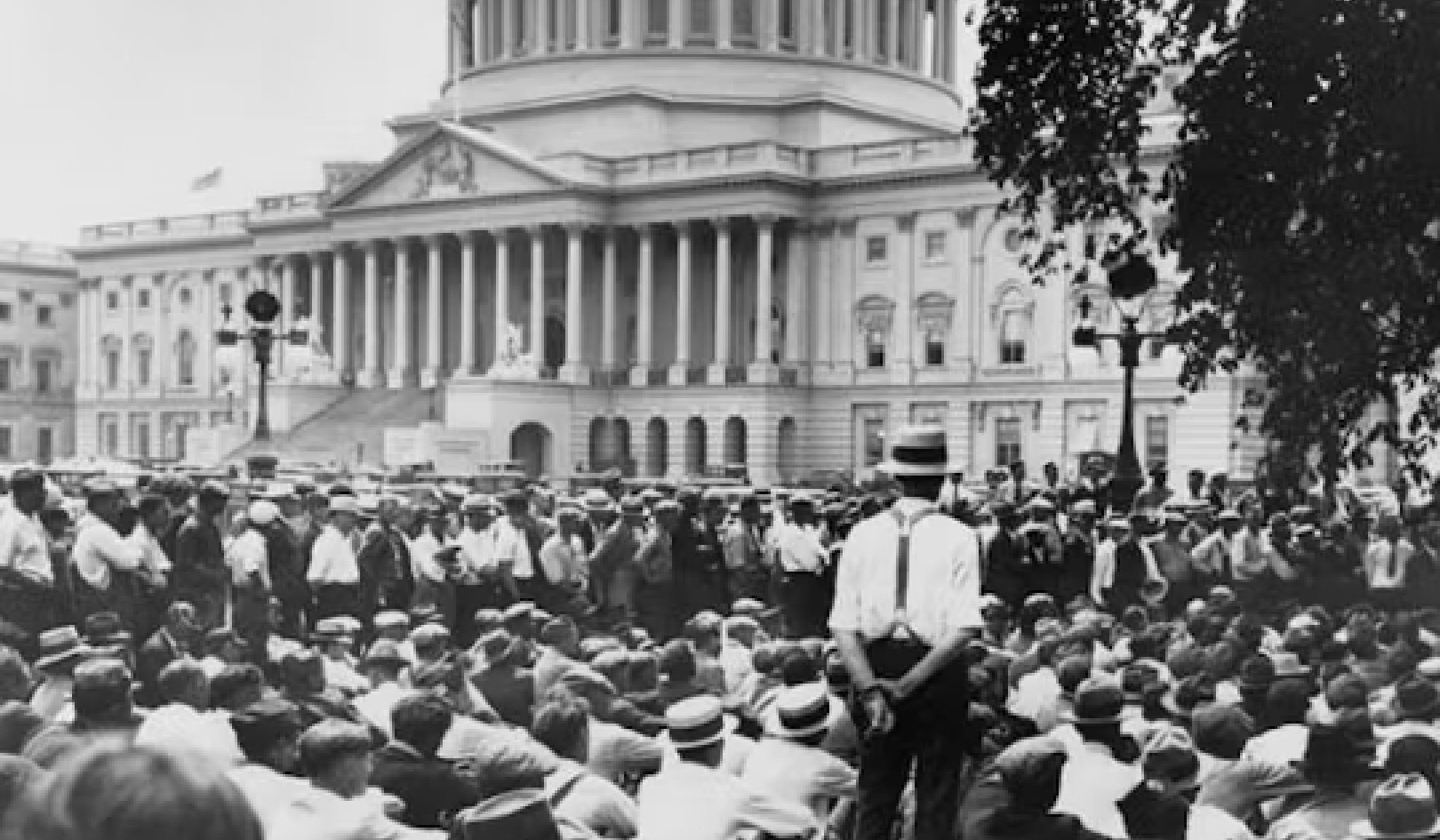 Woody Guthrie’s Words Echo in the Debt Ceiling Debate: Are Politicians Really Working for the People