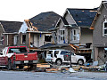 A home damaged by a hurricane, highlighting the rising cost of home insurance due to climate-related disasters.