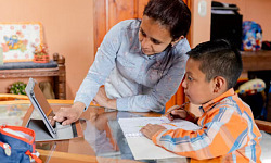 A family learning together at home, representing the rising trend in home education and the benefits it offers for personalized, flexible learning.