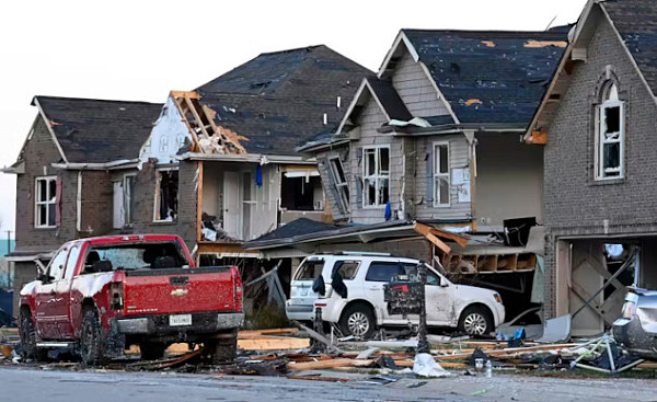 A home damaged by a hurricane, highlighting the rising cost of home insurance due to climate-related disasters.