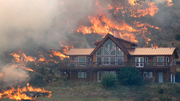 A house surrounded by defensible space that protected it from a nearby wildfire.