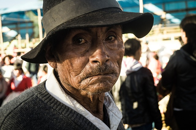 older man looking very sad and tired