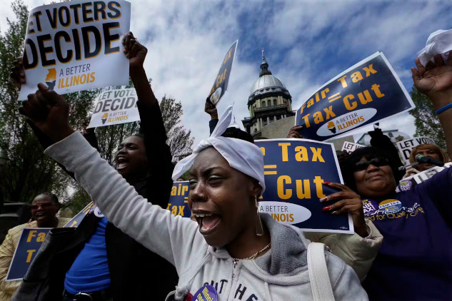 Protesters outside Illinois Capitol advocating for changes in state tax policies