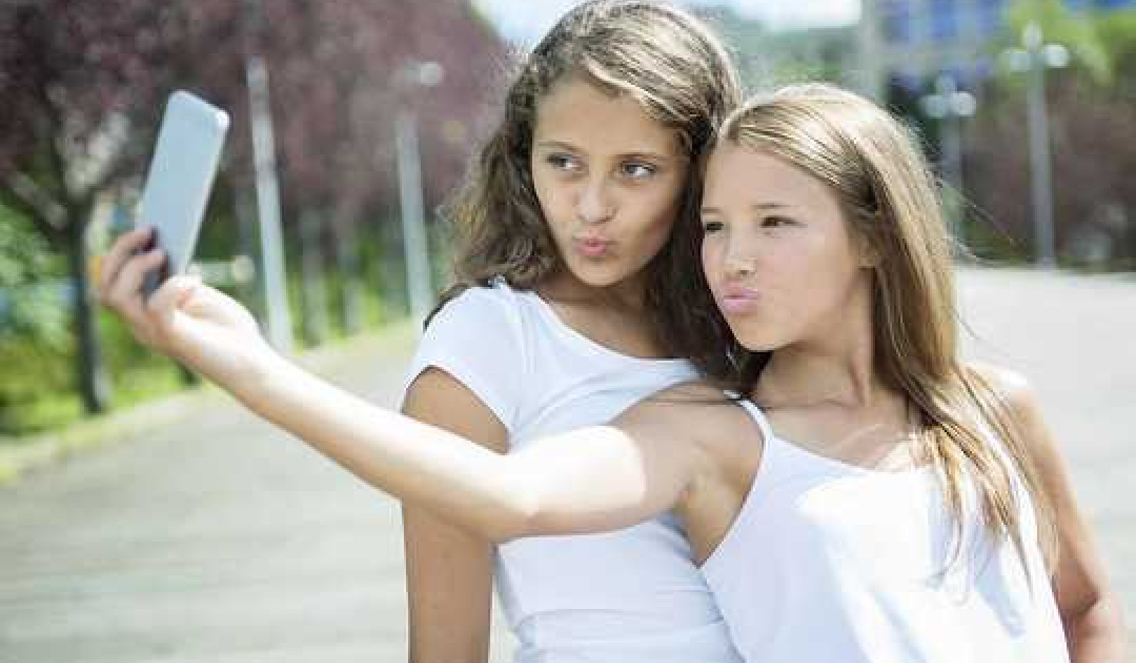 How Taking Selfies Can Take You Out Of The Moment