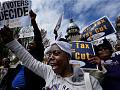 Protesters outside Illinois Capitol advocating for changes in state tax policies