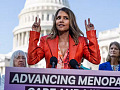 Actor Halle Berry standing in front of U.S. senators proclaiming that she’s in menopause.